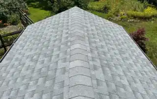 Premier residential and garage roof replacement completed in Charlestown RI by Pawcatuck Roofing Company.
