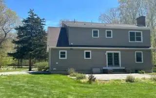 Professional roof replacement and siding installation completed in North Stonington CT by Pawcatuck Roofing Company.