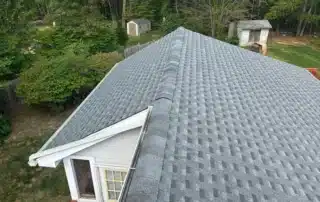 Trusted roof replacement, ridge vent installation, and gutter guard upgrade completed in Westerly RI by Pawcatuck Roofing Company.