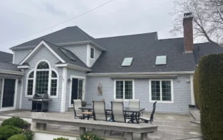 Skilled roof replacement, ridge vent installation, and Velux skylight replacement craftsmanship in Charlestown RI by Pawcatuck Roofing Company.
