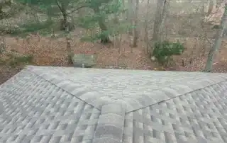 Durable roof replacement and Broan vent installation solution provided in Stonington CT by Pawcatuck Roofing Company.