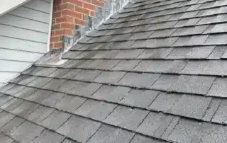 Durable roof replacement, ridge vent installation, and Velux skylight replacement solution provided in Charlestown RI by Pawcatuck Roofing Company.