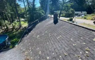 Quality roof replacement, ridge vent installation, and gutter guard upgrade for a Westerly RI property by Pawcatuck Roofing Company.