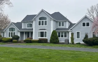 Trusted roof replacement, ridge vent installation, and Velux skylight replacement completed in Charlestown RI by Pawcatuck Roofing Company.