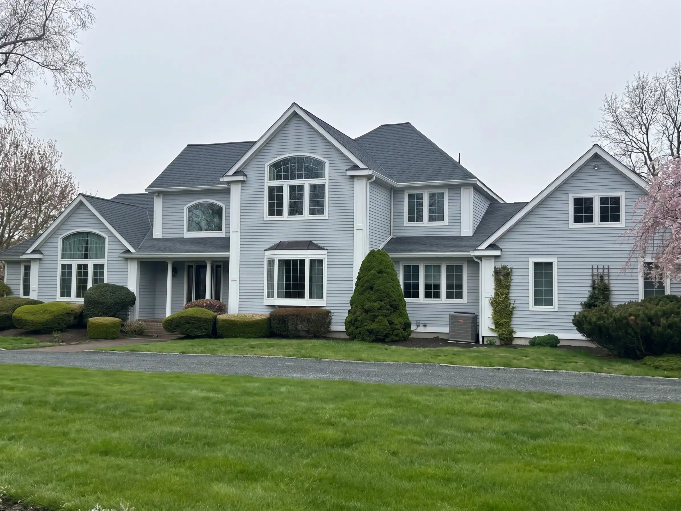 Affordable roof replacement, ridge vent installation, and Velux skylight replacement completed in Charlestown RI by Pawcatuck Roofing Company.