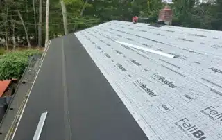 Professional roof replacement, ridge vent installation, and gutter guard upgrade completed in Westerly RI by Pawcatuck Roofing Company.