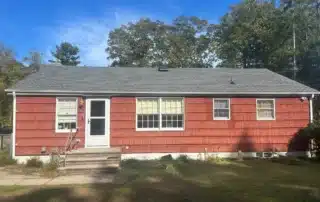 Expert residential and garage roof replacement completed for a Charlestown RI property by Pawcatuck Roofing Company.