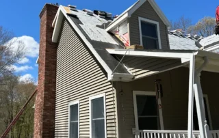Efficient roof replacement and siding installation work performed in North Stonington CT by Pawcatuck Roofing Company.